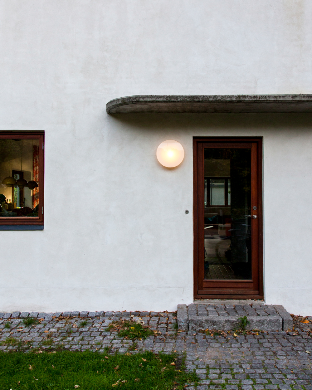 AJ Eklipta Outdoor Wall Lamp | Louis Poulsen